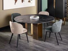 Refined color and material combination of the chairs Shiba and the Mirage table