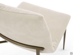 The tubular structure gently supports the backrest of the chair