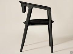 The outline of the chair shows an essential style yet carefully finished details