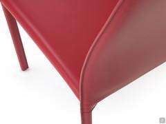 Rear view of the Hekla chair, detailing the high back and upholstered legs