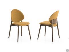 Designer chair in bent wood with upholstered seat and back