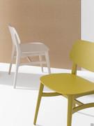 Chloe wooden designer chair which matches perfectly with the other complements in the collection