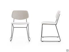 Chloe designer chair with thin sled legs in a contrasting colour compared to the seat and backrest