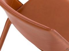 Detail of the structure thickness of Madera chair, Madera, with soft upholstery below the external cover