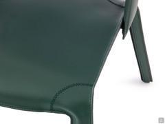 Detail of the padded and upholstered leather seat with matching visible stitching