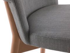 Modern chair upholstered in Sophos fabric with light padding for increased seating comfort