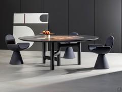 Youpi chairs matched to the Pivot table with central ceramic insert