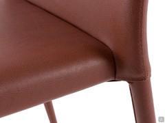 Detail of the connection between seat and backrest of the Akira 2.0 chair upholstered in faux leather