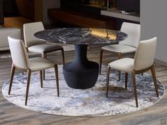 Chairs Hiru matching the elegant dining table Anfora