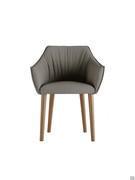 Front view of Gladys chair covered in leather with four straight legs in Canaletto walnut painted ash-wood