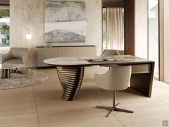 Gladys chair with bronze-finish 4-spoke metal base, paired with the elegant Vortex executive desk