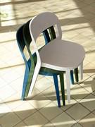 Minima wooden chairs in the model without armrests, stackable up to 4 high