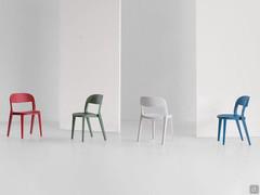 Minima chairs all made of wood, offered here in stained ash in Red Cherry, Olive Green, White and Sky Blue