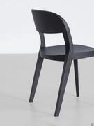 Detail of solid ash back legs, inclined and turned to accommodate the curved ash plywood backrest