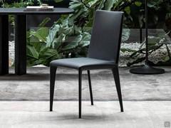 Elegant and modern chair Filly characterized by dark-toned leather upholstery