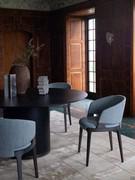 Velis lounge armchairs around the dining table