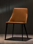 Antelos chair in cognac belting leather with black metal legs