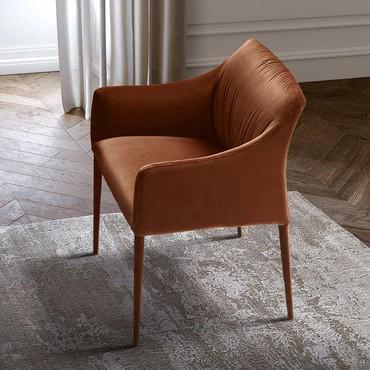 Elegant and fully-upholstered Iside armchair