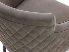 Detail of the Nubuck suede upholstery, worked on the outside with diamond quilting