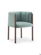 Domizia armchair shown here in the version with quilted upholstery with vertical stripes