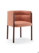 Domizia armchair shown here in the version with horizontal quilted upholstery