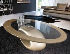 Dubai elliptical coffee table with sculptural champagne lacquered base and extrawhite champagne screen-printed glass top, designed for sofa front.