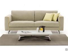 Bento coffee table placed in front of a sofa, it can be adjusted in height by the millimetre