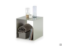 Glass end table perfect to store below a basket for blankets