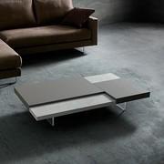 Viktor low coffee table in stone effect with high surfaces in London Grey Fenix and low ones in lamé platinum