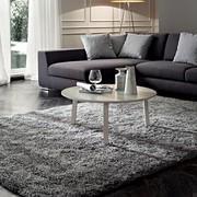 Percival round coffee table with 3 legs in ecru matt lacquer