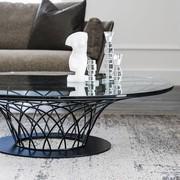 Detail of the black embossed metal wire base of Nido coffee table 