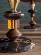 Detail of the jewel base in Port Saint Laurent marble, canaletto walnut, amber glass and gold insert