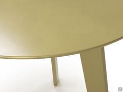 Detail of the coffee table in brass metallic finish