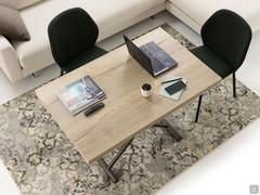 Eureka coffee table turned into a dining table and used as a working area in the living room