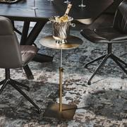 Step golden metal side table by Cattelan is adjustable in height