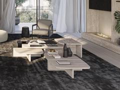 Travertine marble coffee table Auri, available in the three heights of 25, 31 and 40 cm for different uses side or sofa front, or to create important compositions as in photo