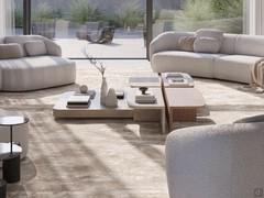 Combination of Auri travertine and Canaletto walnut coffee tables and Token low square coffee table: a composition that provides table tops at two different heights