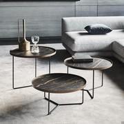 Trio of Billy tables by Cattelan - all positioned in front of a sofa