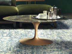 Stem oval coffee table n Port Laurent marble with a metal structure in the Sunset Copper finish