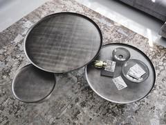 Top view of the coffee tables with brushed grey painted metal top