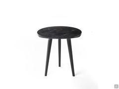 Leander round coffee table with a top made from Black Marquinia marble