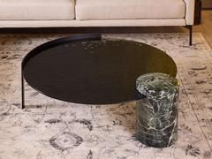 Piece round glass and marble coffee table, a sofa-front complement where metal, glass and stone interact with taste and harmony