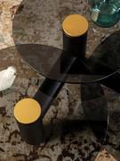 Cosmo coffee table with three tops button detail in matte gold lacquered metal which contrasts with the tops and frame.