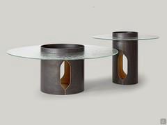 Bullet cylinder-shaped coffee table with glass top available as an end table too for a use on the sofa side