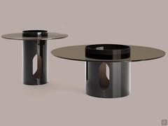 Bullet coffee tables with smoked vetor top and two-tone paint finish: on the outside, the distinctive Gloss Black glossy finish contrasts with the satin bronze effect on the inside