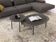 Tobi irregular coffee table with a glass top in a composition with two tables in different sizes