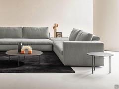 Couple of Tobi coffee tables used individually beside and in front of the sofa