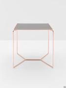 High square coffee table Proust with a structure in Copper metal and top in fumé glass