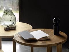 Couple of Kentucky round coffee tables in natural and caramel knotty oak