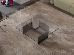 Eze low coffee table with transparent smoked glass top and design base in titanium painted metal